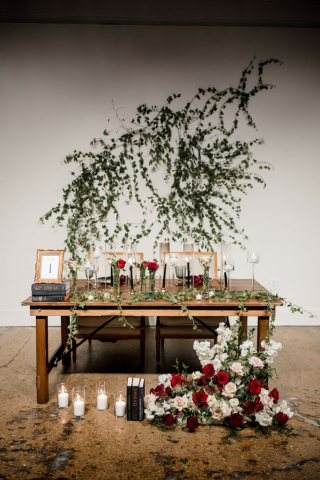 reception, floral, candles, books, greenery, sweetheart table, Saint Elle